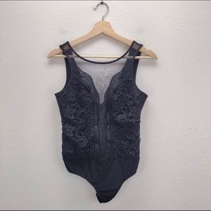 Lulu's black mesh lace deep vneck sleeveless bodysuit snaps at bottom